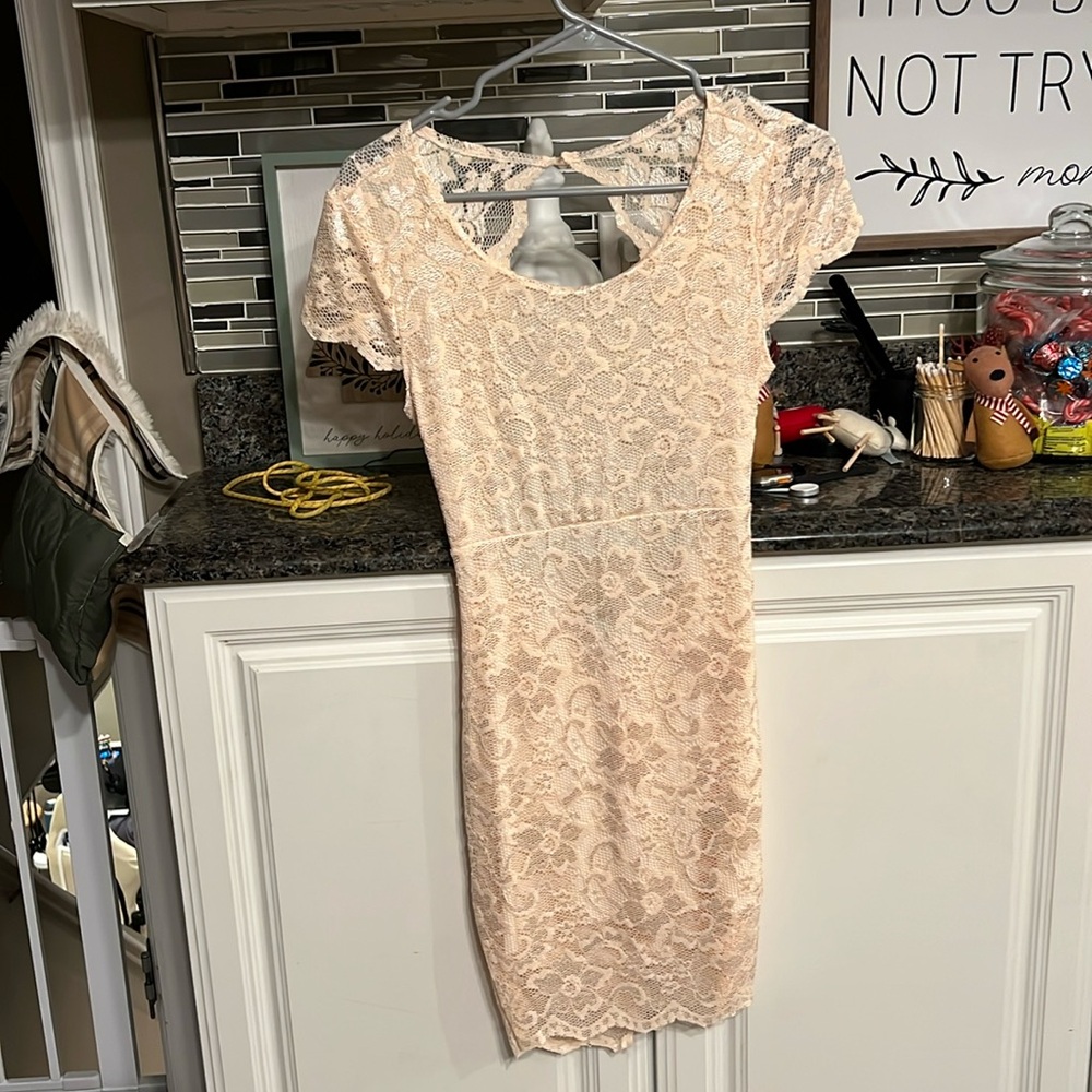 Baby pink short sleeve lace dress with open back